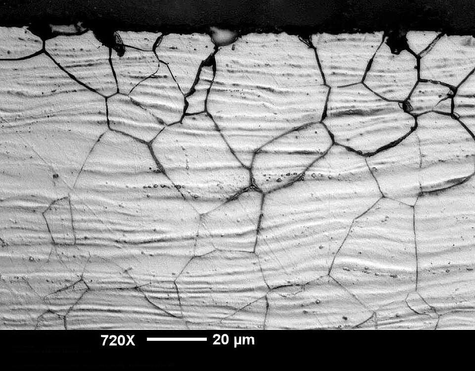 Real micrograph of intergranular attack in austenitic cold rolled stainless steel sheet