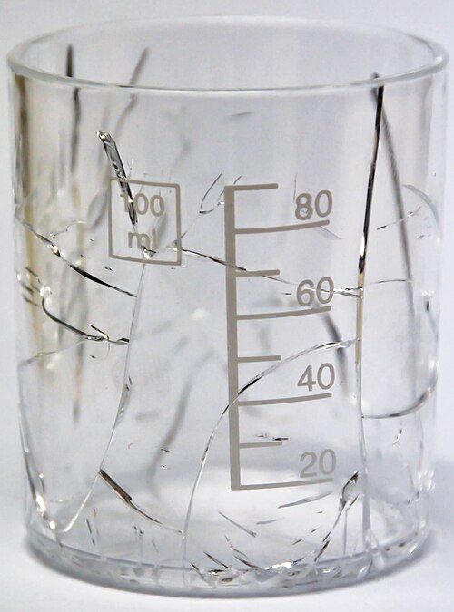 Real solvent-induced crazing and cracking in a PMMA measuring cup