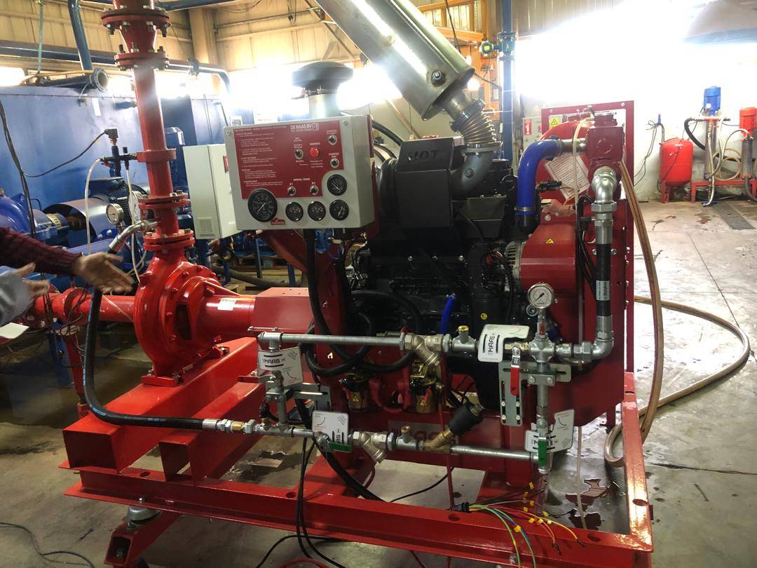 Stationary fire-water pump package for oil and gas facilities
