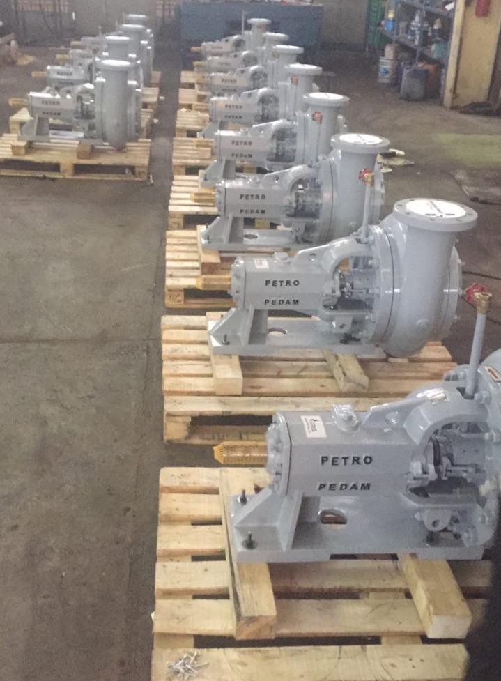 Slurry pump assembly photographed in a workshop, supplied by Petropedam